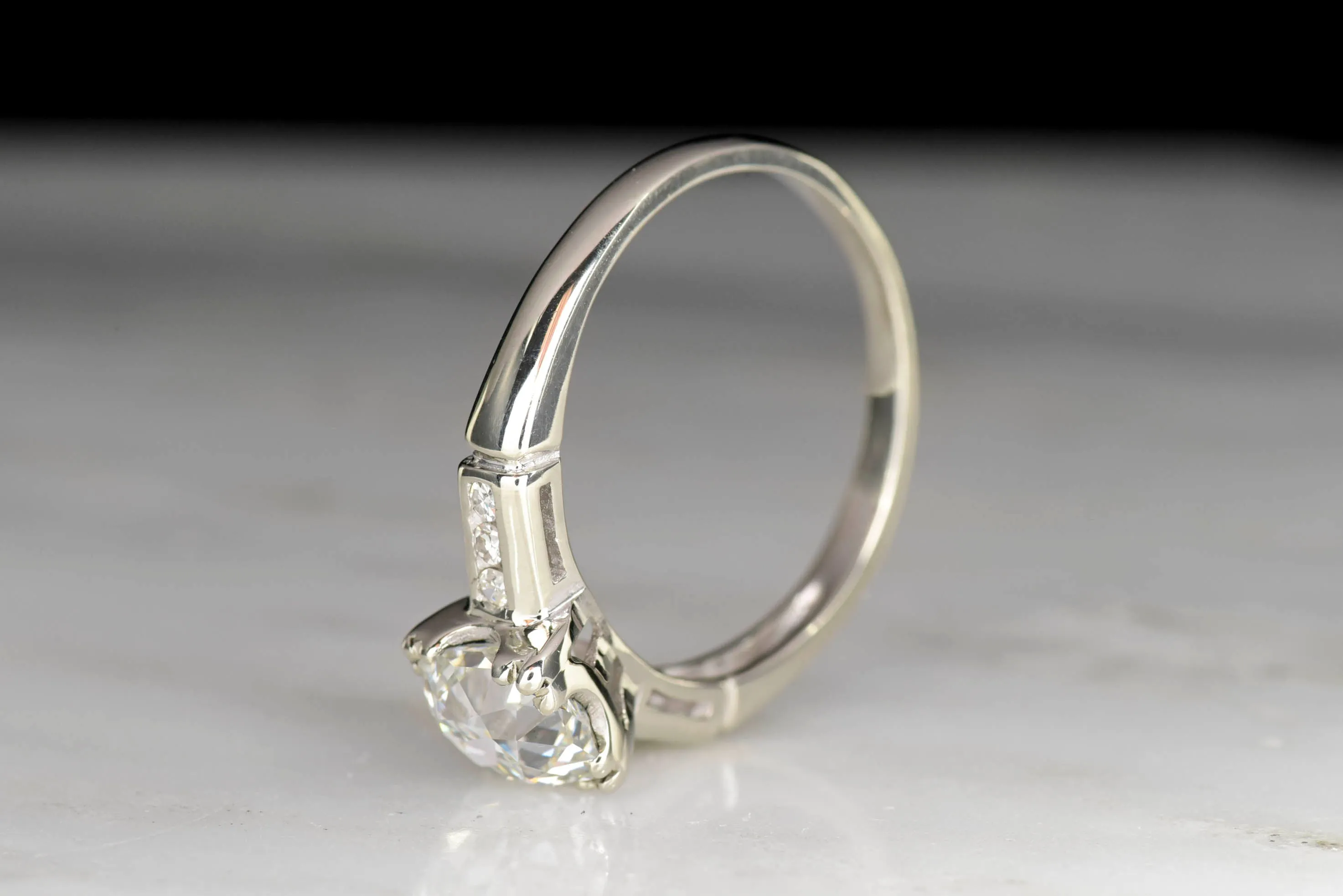 Classic Mid-Century Engagement Ring with an Old Mine Cut Diamond Center