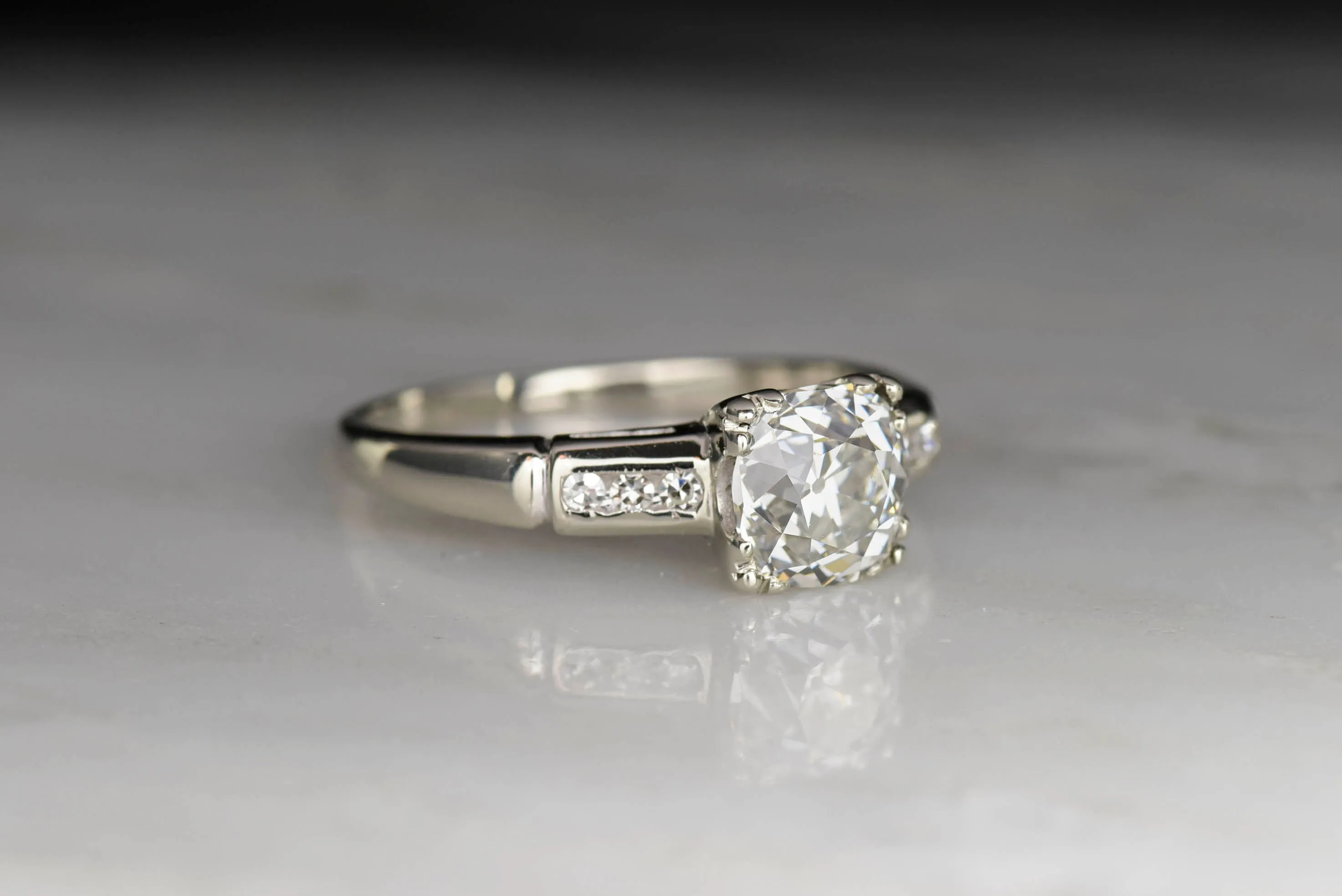 Classic Mid-Century Engagement Ring with an Old Mine Cut Diamond Center