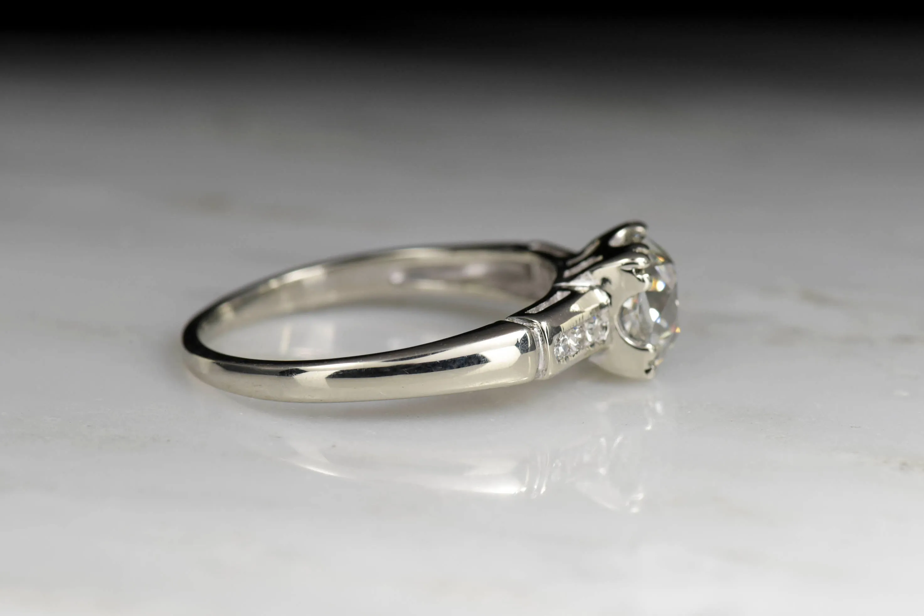 Classic Mid-Century Engagement Ring with an Old Mine Cut Diamond Center