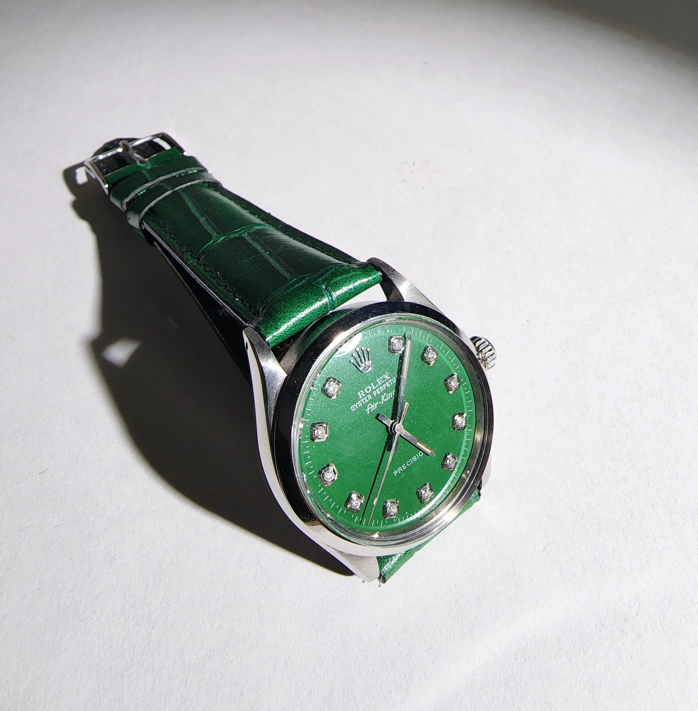 Custom Vintage Rolex Date with a custom British Racing Green dial and a custom green strap