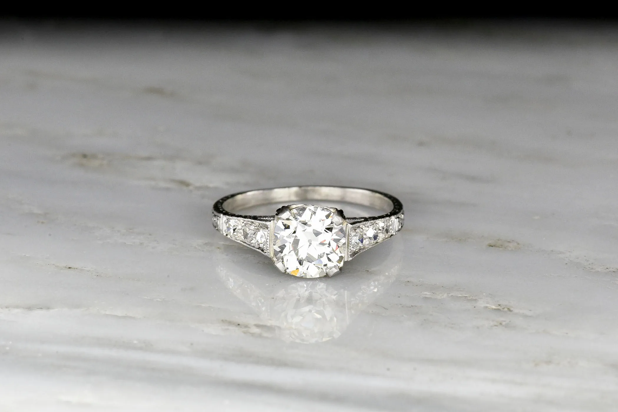 Ornate Edwardian Platinum Engagement Ring with a GIA Old European Cut Diamond Center