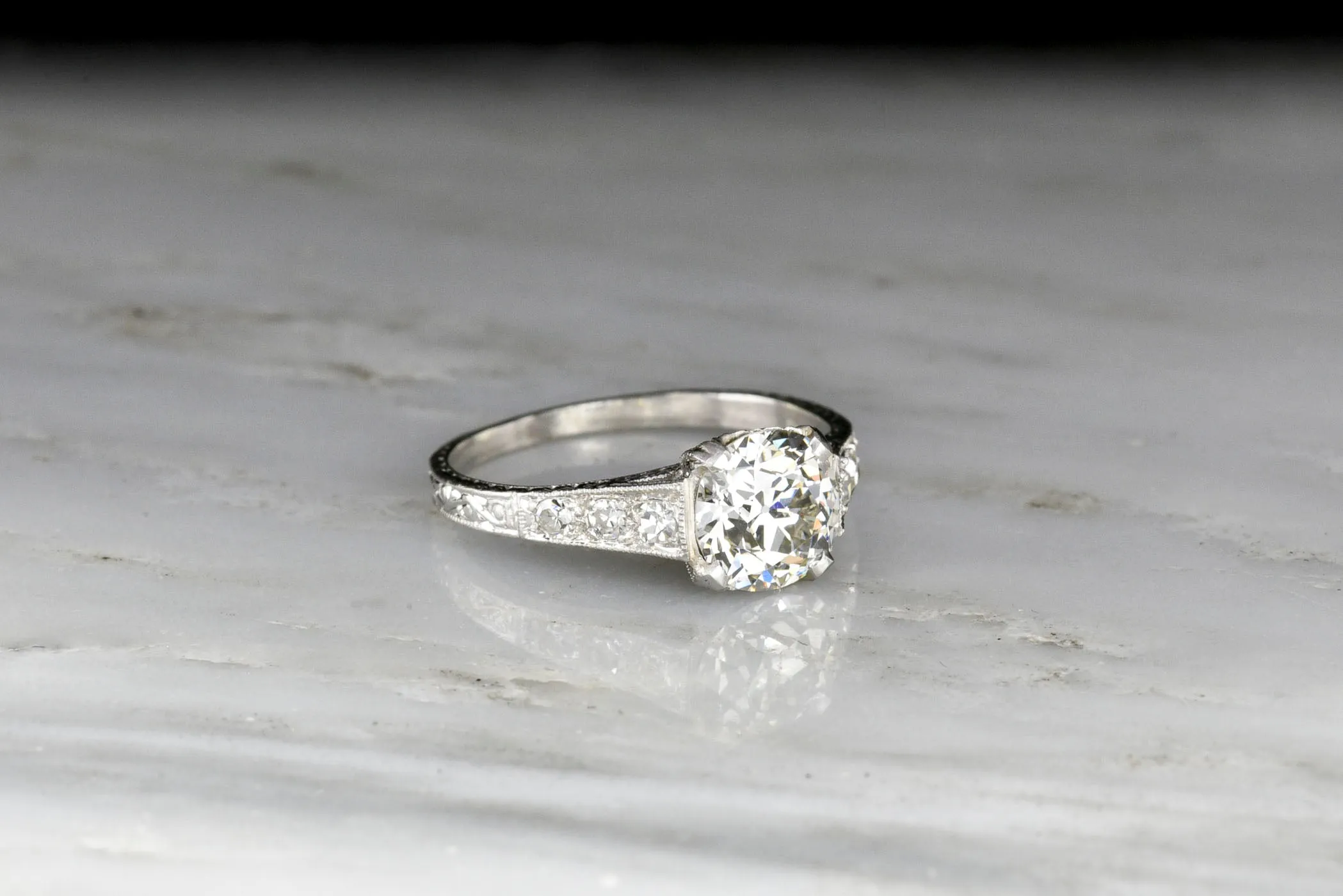 Ornate Edwardian Platinum Engagement Ring with a GIA Old European Cut Diamond Center
